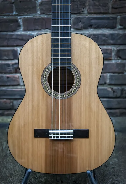 Cedar top classical guitar: close front view of the body