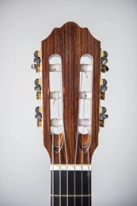 Spruce top classical guitar: rosewood headstock from the front