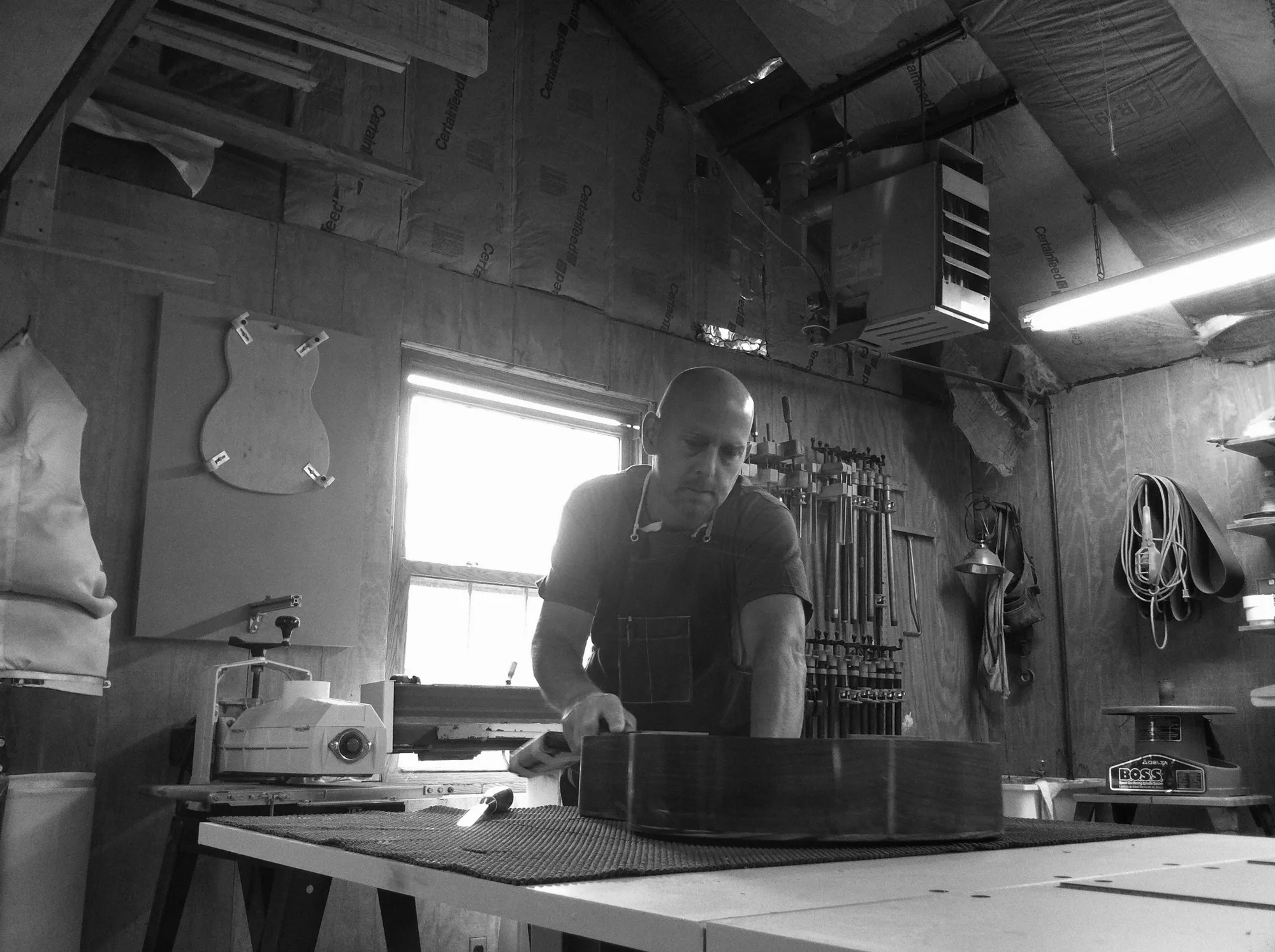Tom Harvey at the bench in his workshop